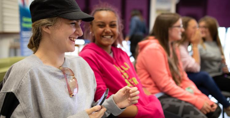 Group of young volunteers smiling at the camera